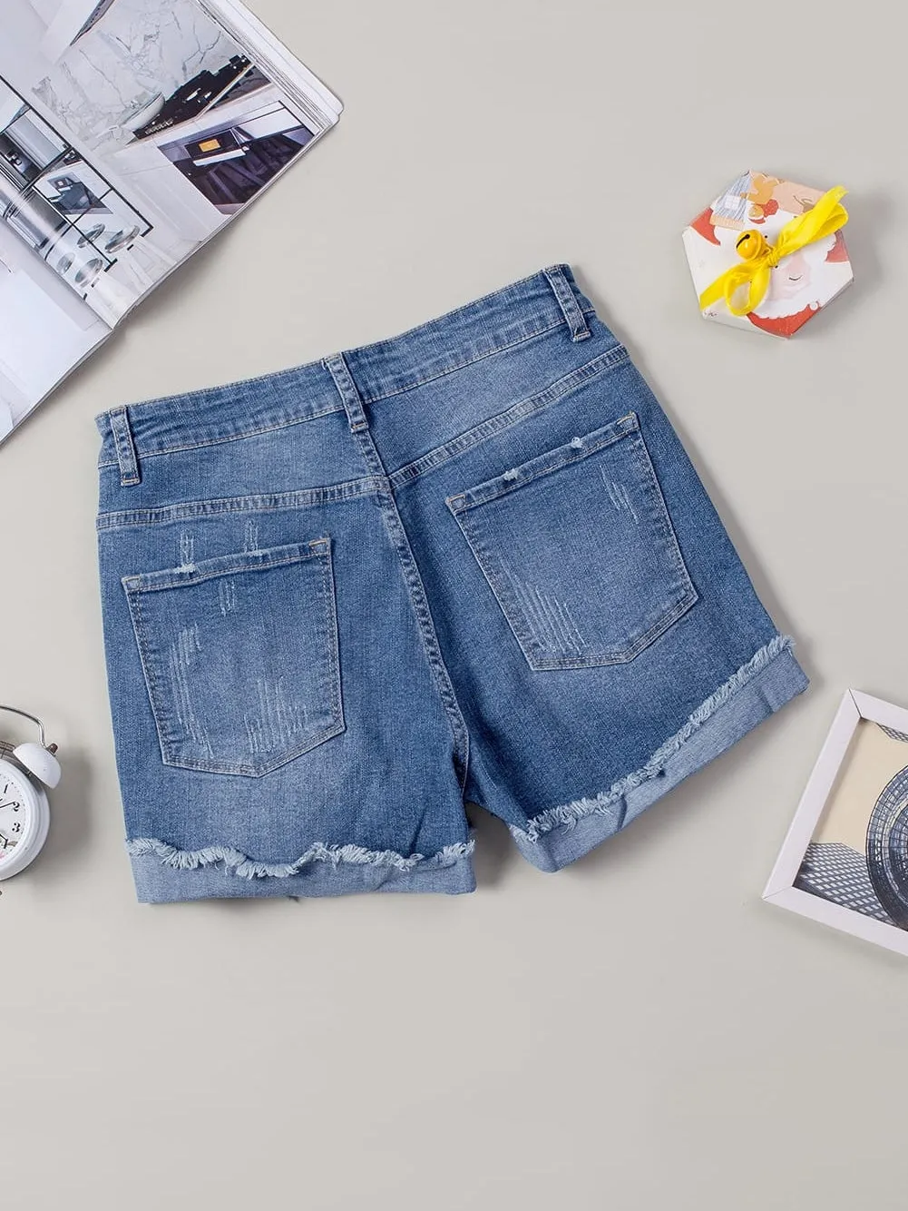 Blue Ripped Denim Shorts with Yellow Floral Patches